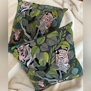 Matching embroidered pillows, anthropology style